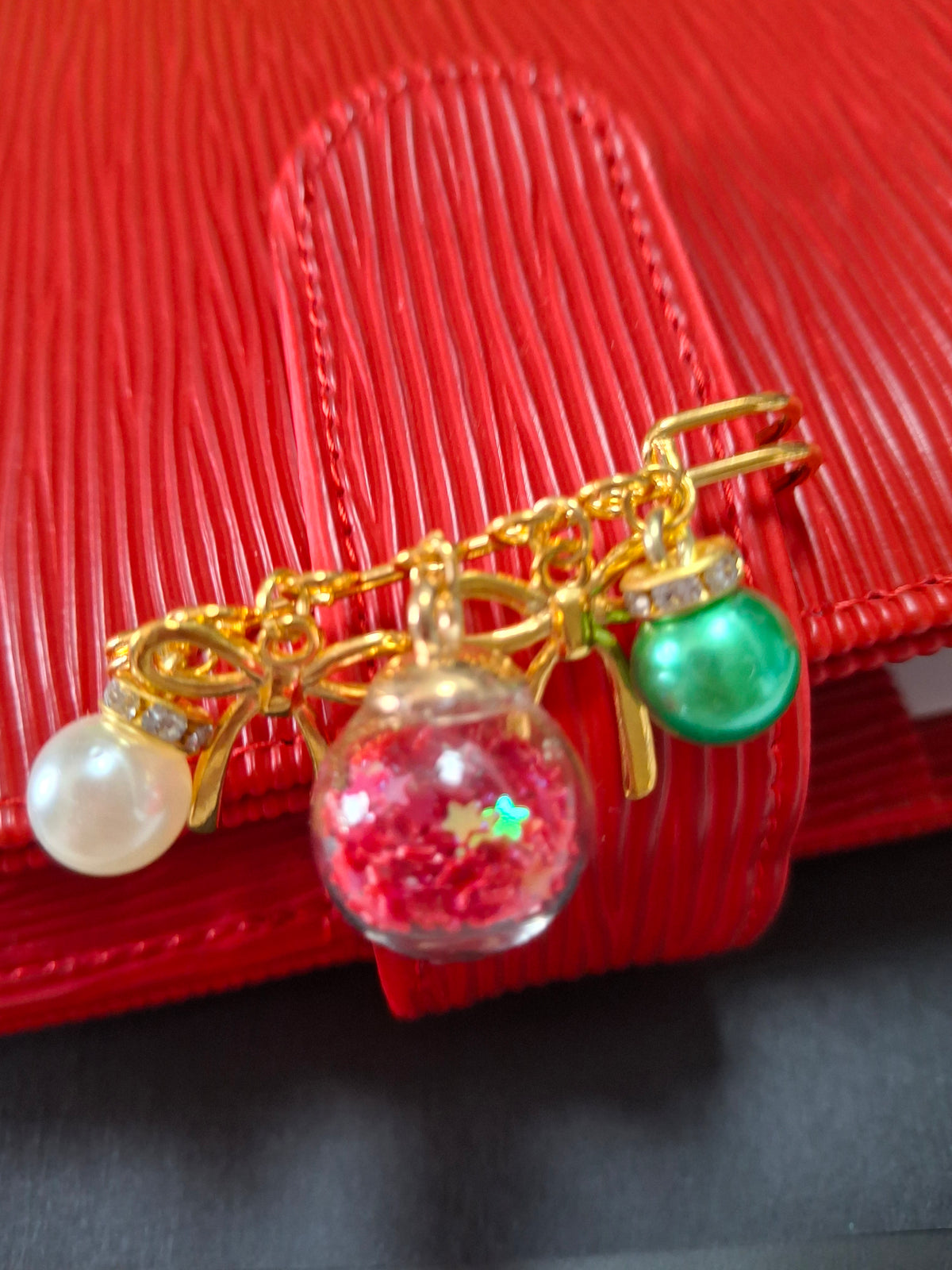 Baubles & bows safety pin binder decor
